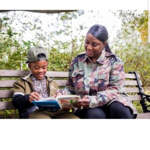 Sherrikka Myers reads to her grandson.